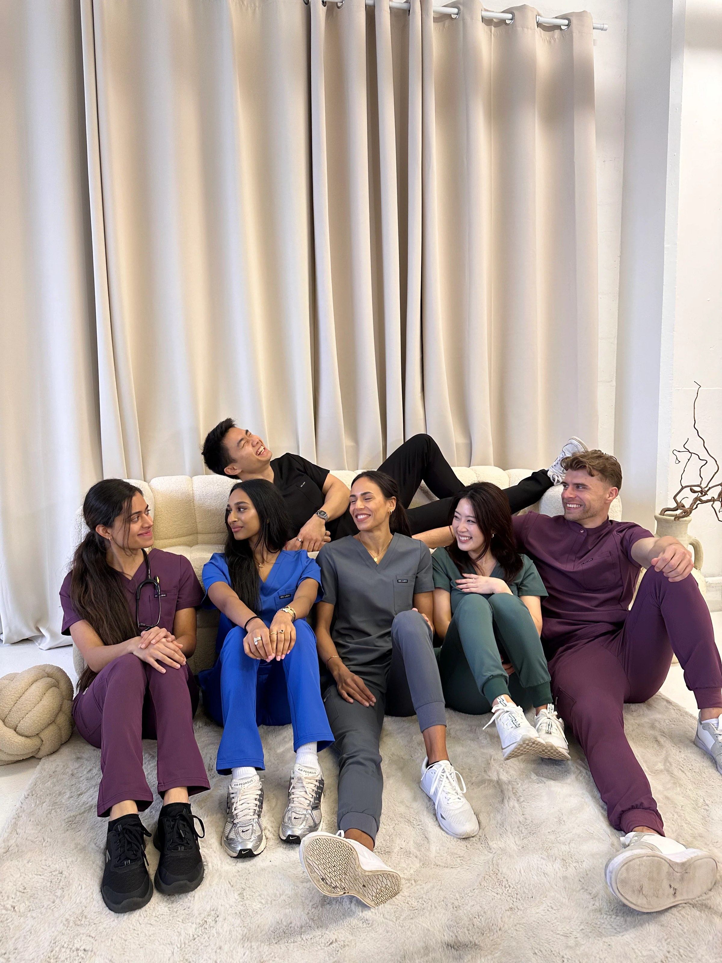 Six clinicians in ONCALL scrubs